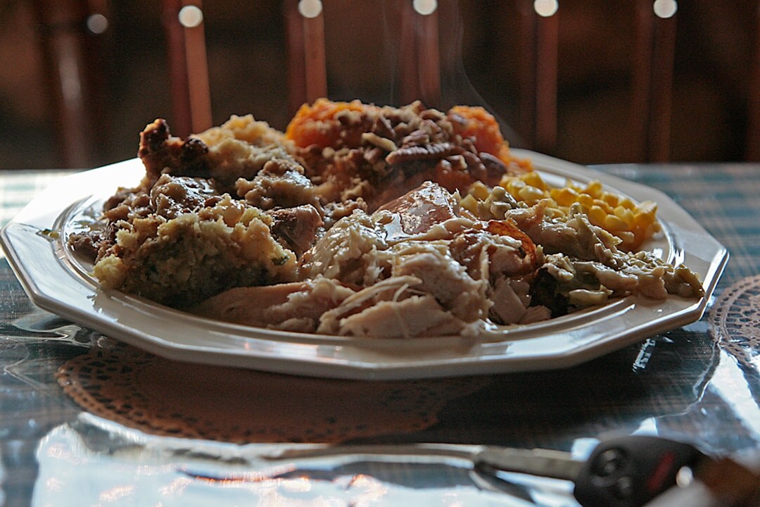 Traditional Czech dinner table with roast meat, dumplings and gravy