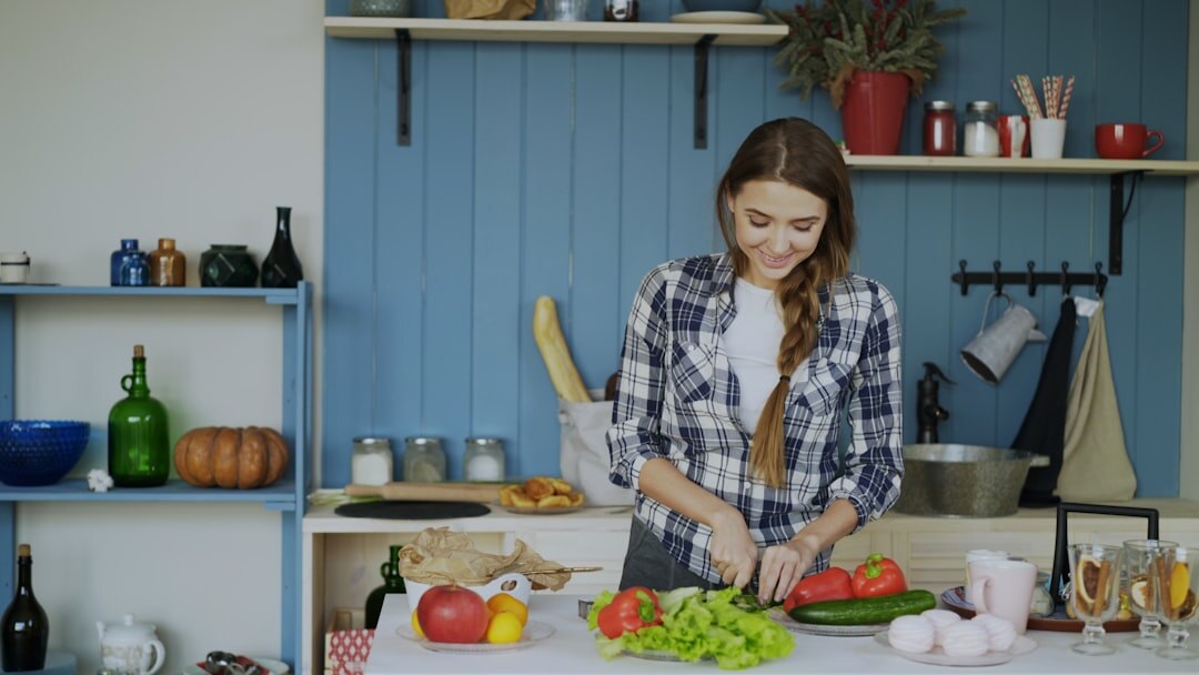 person chopping vegetables