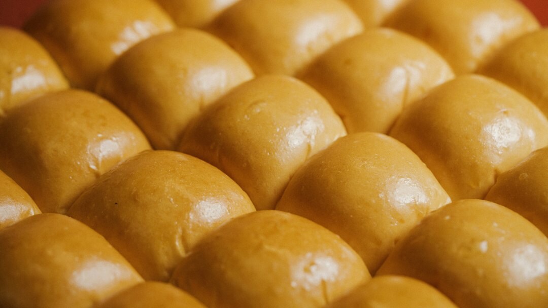 Freshly baked Czech buchty on a baking tray